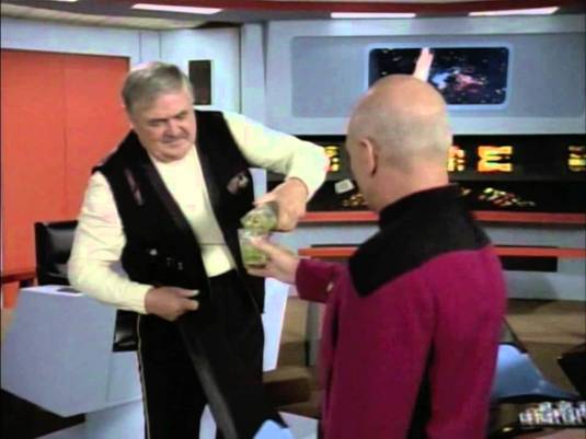 Aldebaran green whisky, Scotty pouring for Picard, www.nerdatron.com, sci-fi drinking guide