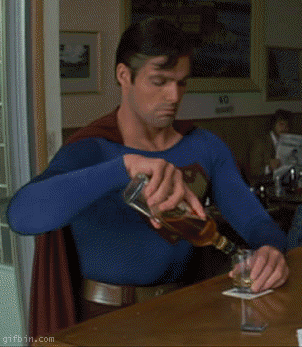 superman whiskey gif, www.nerdatron.com, whiskey in sci-fi, fantasy, and comics.gif